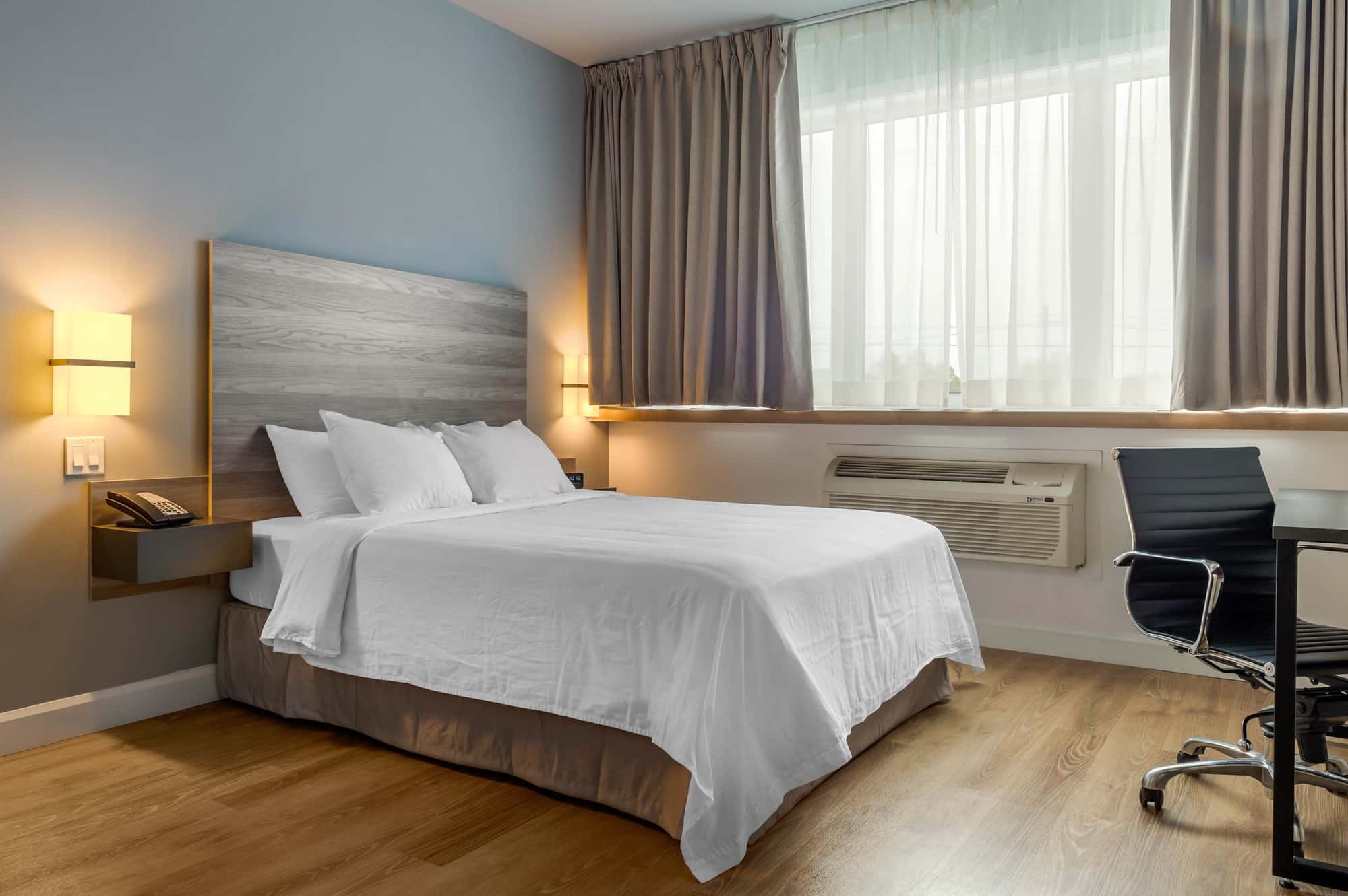 Hotel room with one queen size bed for disabled persons